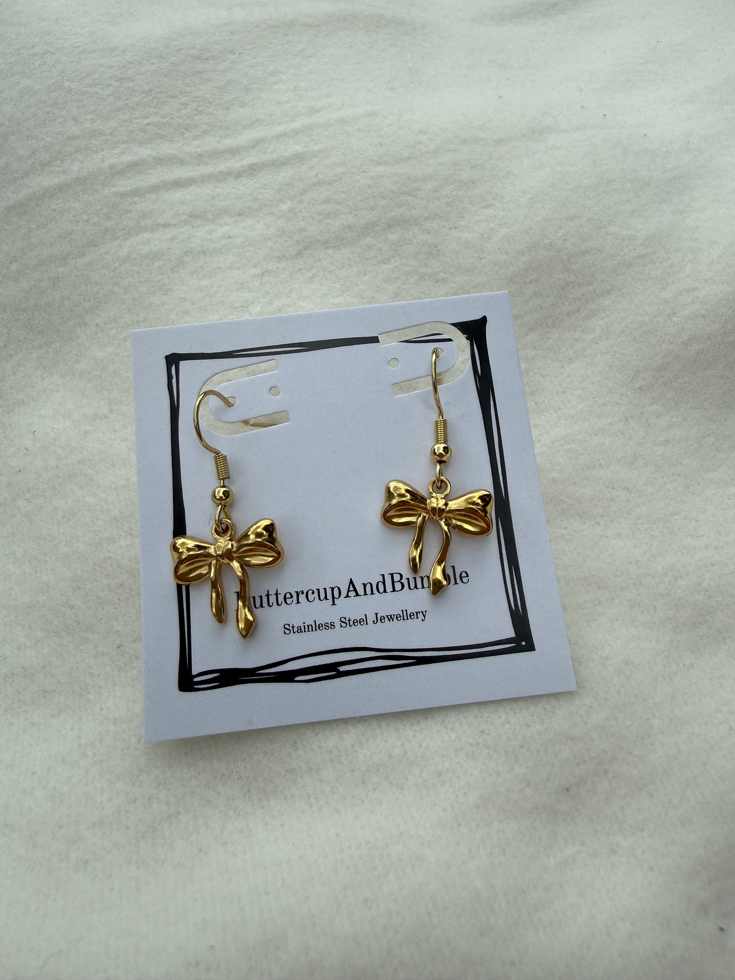 Gold dainty bow earrings